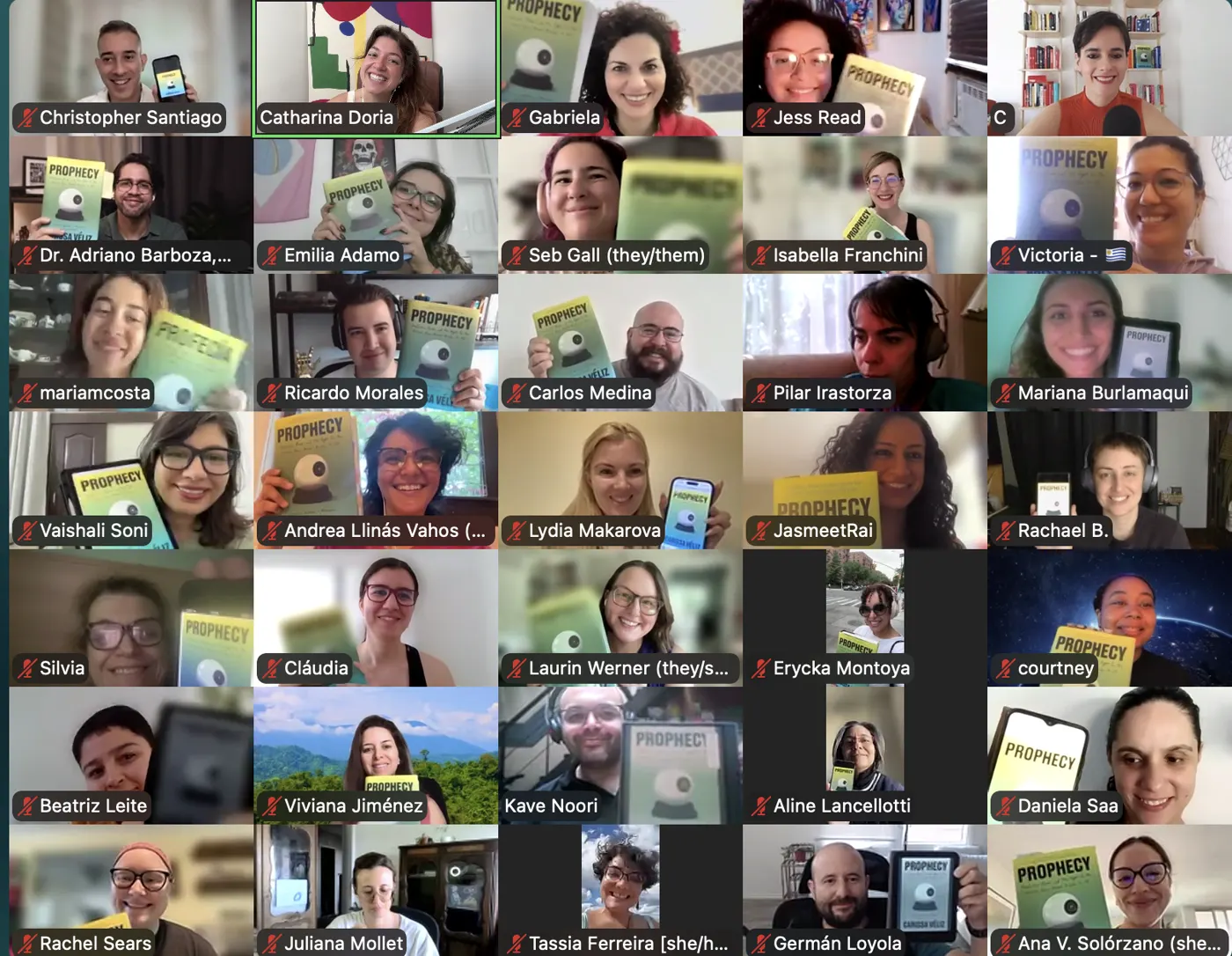 Live AI Survival Club call - 30+ members worldwide holding up Prophecy by Carissa Véliz
